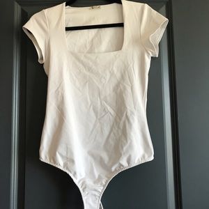 Free People white short sleeved bodysuit
